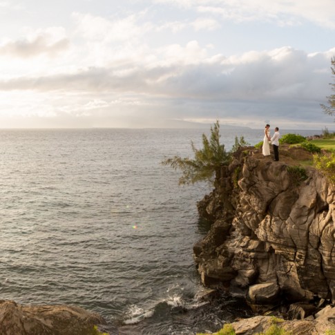 image of wedding couple on a cliff in Kapalua Maui Hawaii
